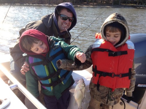August and Wyatt show off a fat Nanticoke white perch after a joint effort
